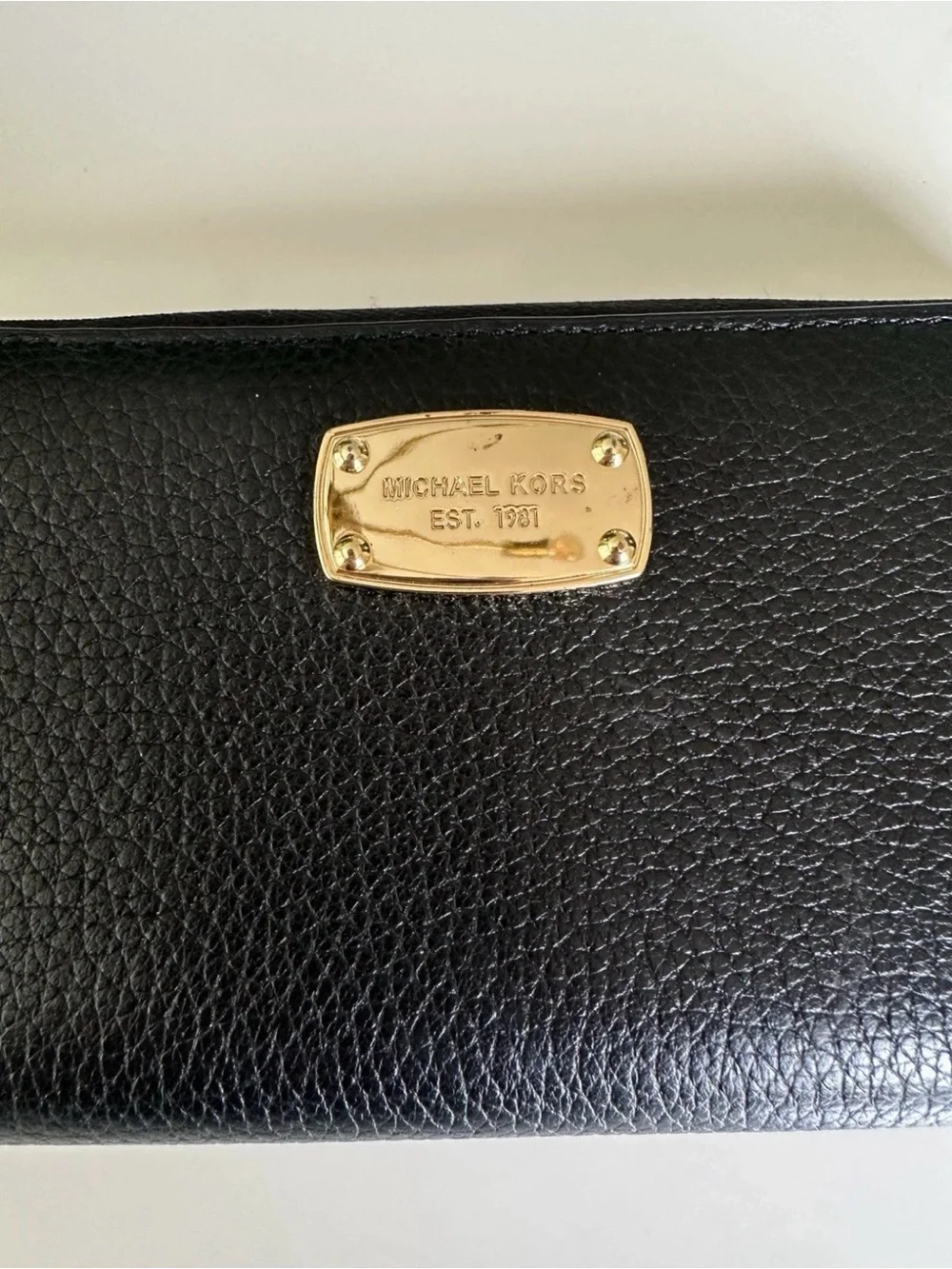 Michael Kors Black Pebbled Leather Zip Wallet with Gold Tone Zipper Pull